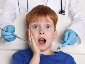A child with anxiety highlighting the ability to treat patients with dental anxiety