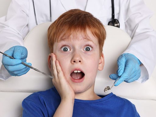 A child with anxiety highlighting the ability to treat patients with dental anxiety